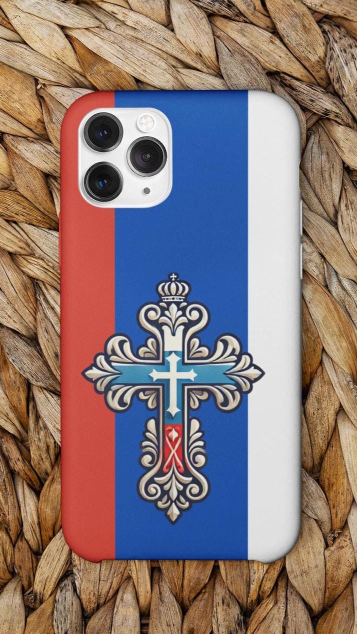 Showcase your Russian Orthodox faith with this premium phone case featuring a Russian Orthodox Cross in white, blue, and red. Made with polycarbonate & TPU, it’s durable, shock-absorbent, and wireless charging compatible.