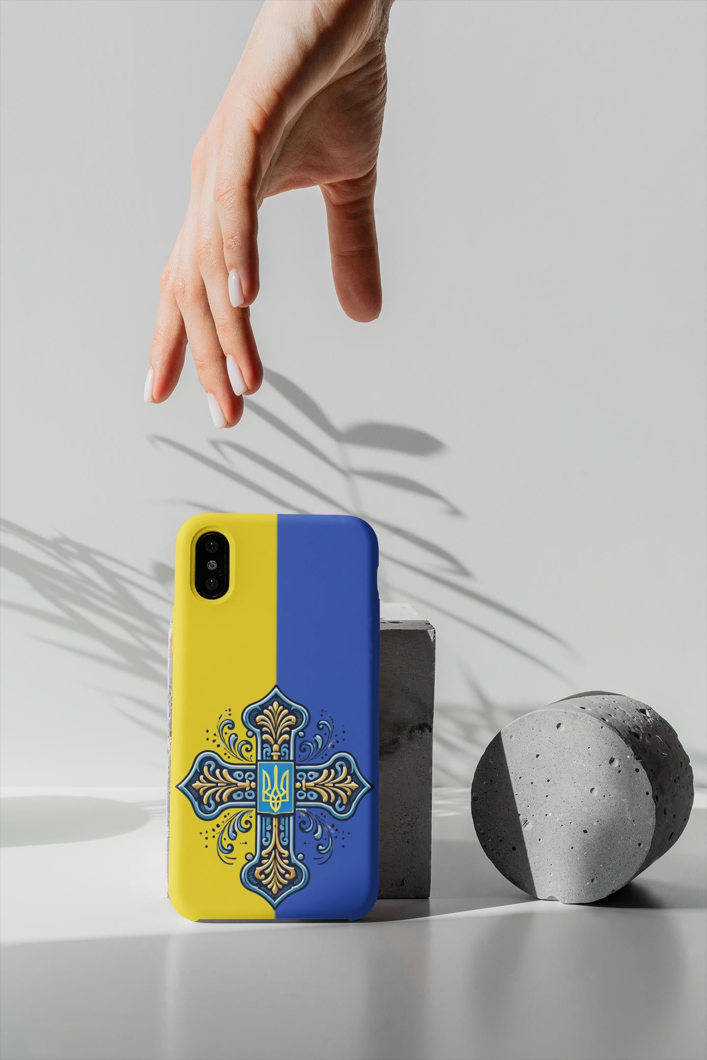 Showcase your Ukrainian Orthodox faith with this premium phone case featuring a Ukrainian Orthodox Cross in blue and yellow. Made with polycarbonate & TPU, it’s durable, shock-absorbent, and wireless charging compatible