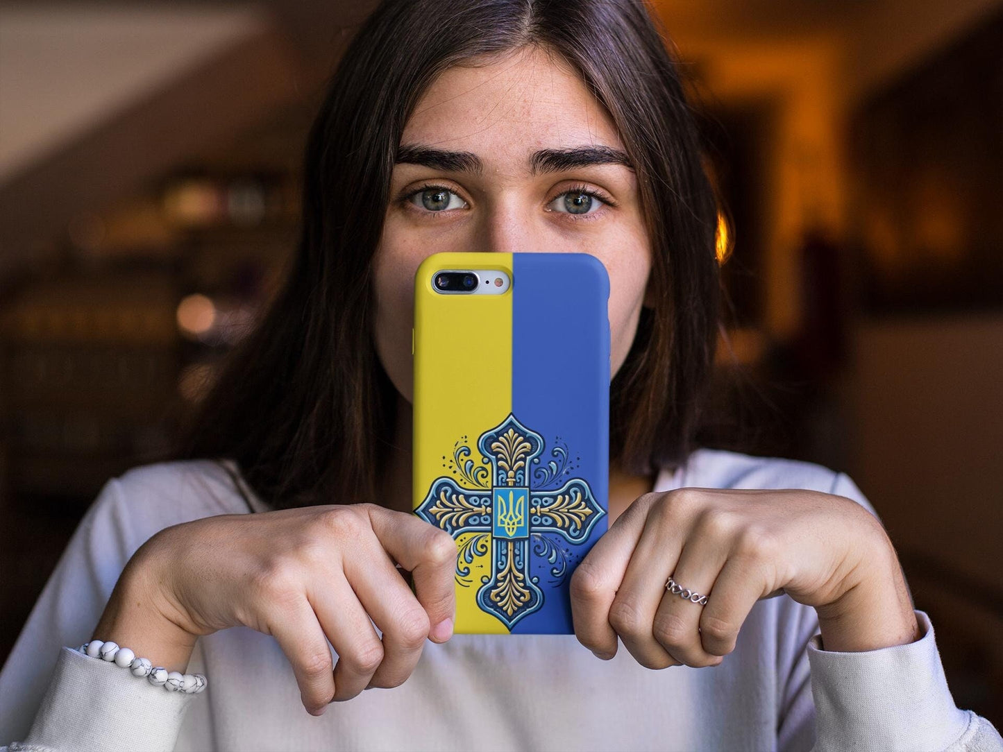 Showcase your Ukrainian Orthodox faith with this premium phone case featuring a Ukrainian Orthodox Cross in blue and yellow. Made with polycarbonate & TPU, it’s durable, shock-absorbent, and wireless charging compatible