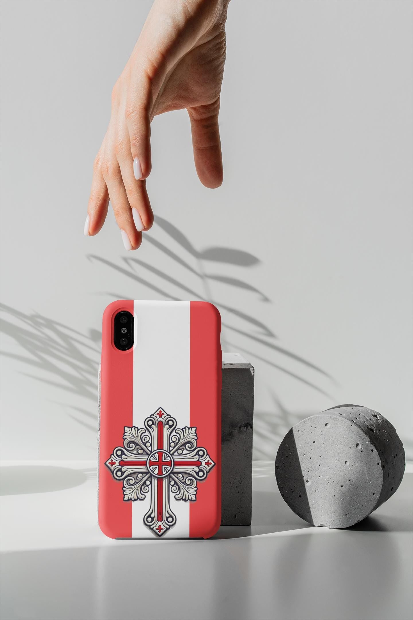 Showcase your English Christian faith with this premium phone case featuring an English Orthodox Cross in red and white. Made with polycarbonate & TPU, it’s durable, shock-absorbent, and wireless charging compatible.