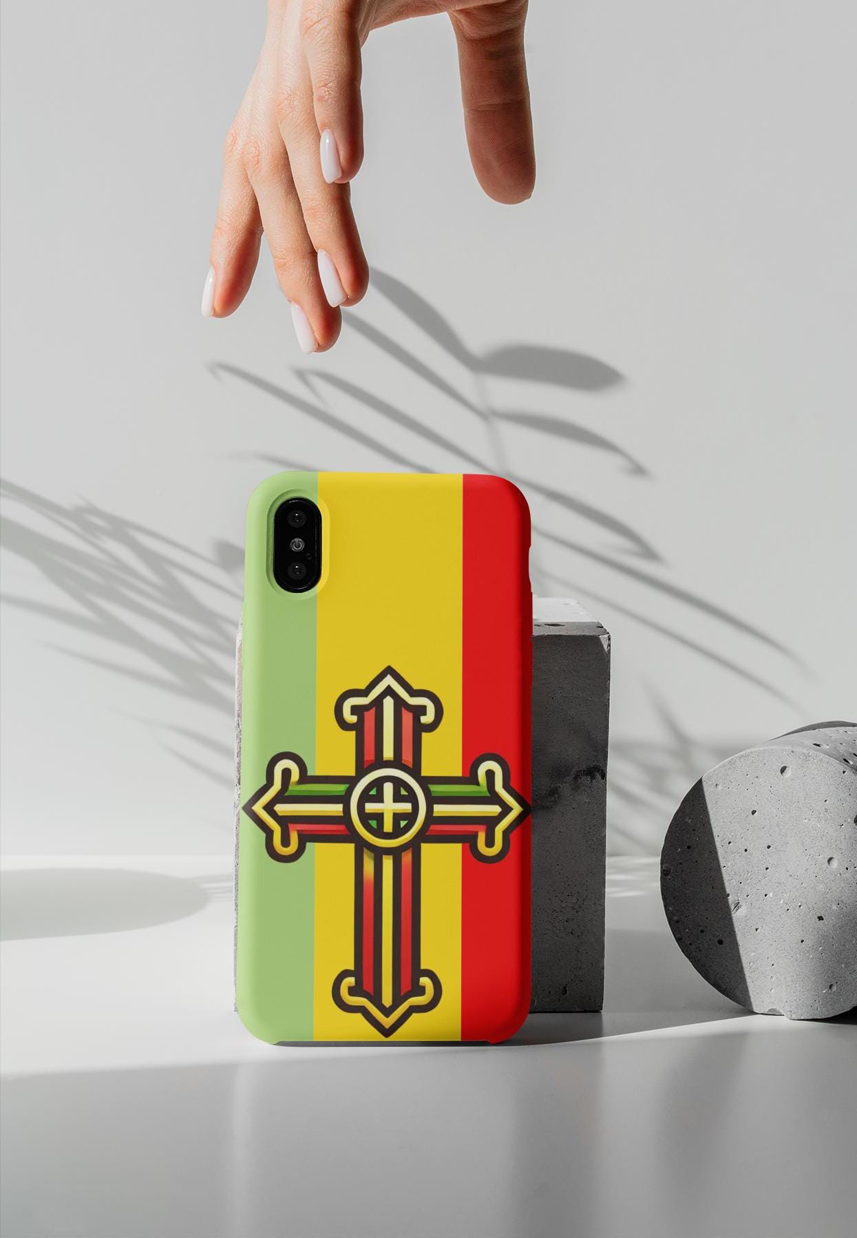 Show your Ethiopian Orthodox faith with this Tewahedo Cross Phone Case! Featuring a Ge’ez Orthodox design, it’s durable, lightweight & wireless charging compatible. A perfect Christian gift for iPhone & Samsung. Order now and carry your faith daily!