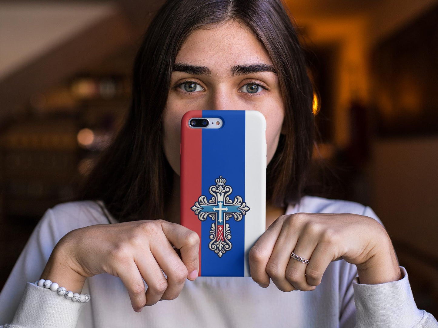 Showcase your Russian Orthodox faith with this premium phone case featuring a Russian Orthodox Cross in white, blue, and red. Made with polycarbonate & TPU, it’s durable, shock-absorbent, and wireless charging compatible.