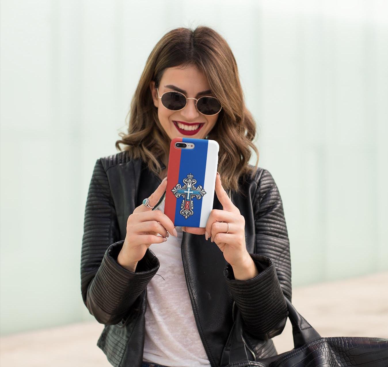 Showcase your Russian Orthodox faith with this premium phone case featuring a Russian Orthodox Cross in white, blue, and red. Made with polycarbonate & TPU, it’s durable, shock-absorbent, and wireless charging compatible.