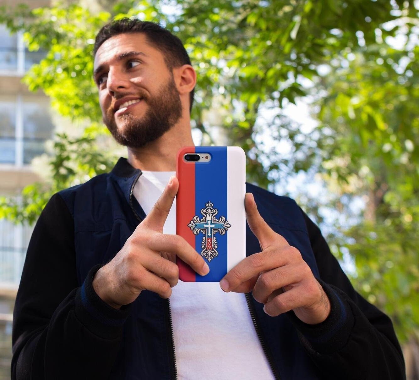 Showcase your Russian Orthodox faith with this premium phone case featuring a Russian Orthodox Cross in white, blue, and red. Made with polycarbonate & TPU, it’s durable, shock-absorbent, and wireless charging compatible.