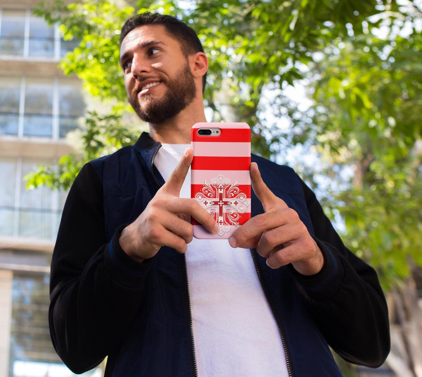 Showcase your Georgian Orthodox faith with this premium phone case featuring a Georgian Orthodox Cross in red and white. Made with polycarbonate & TPU, it’s durable, shock-absorbent, and wireless charging compatible.