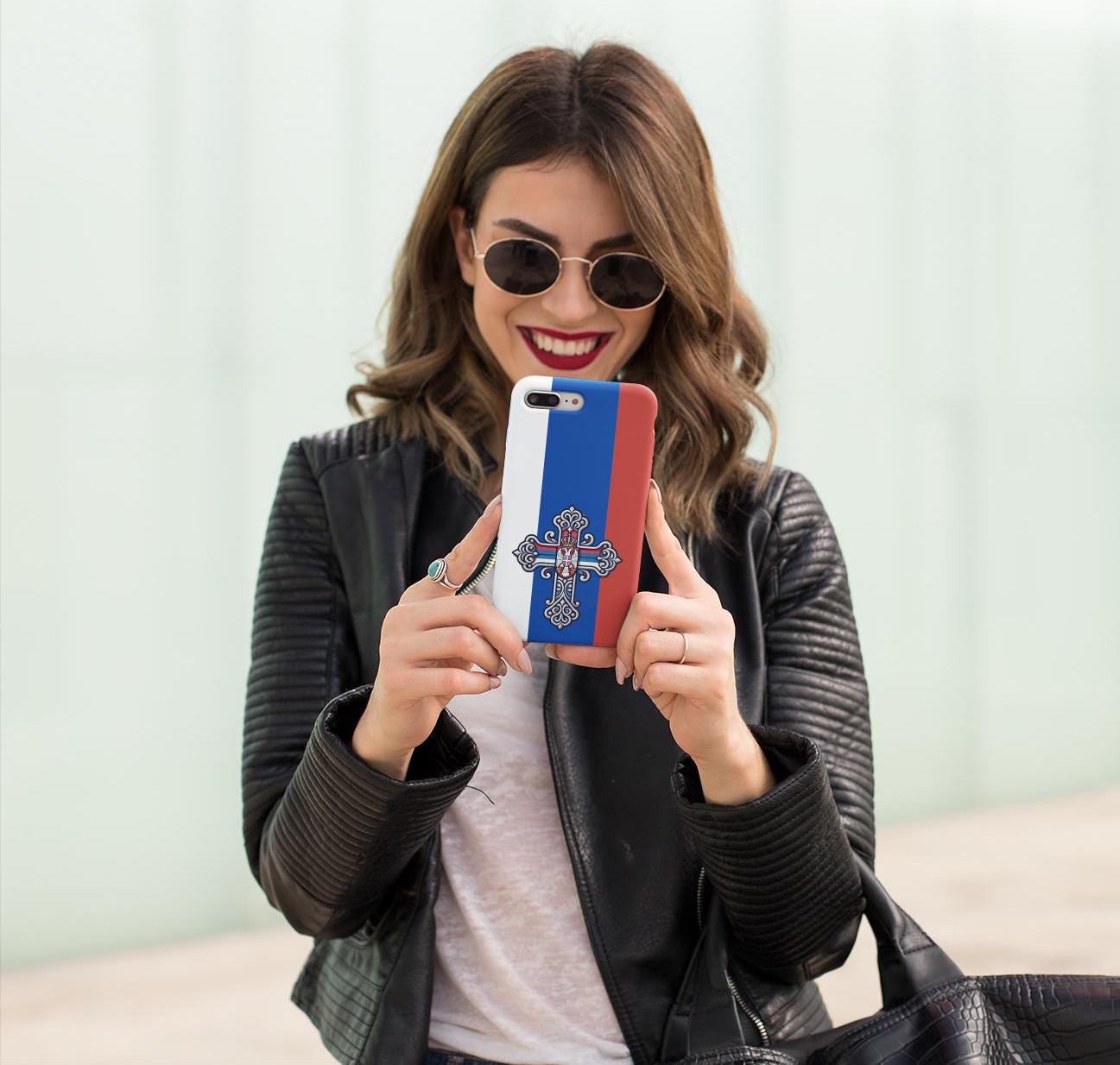 Showcase your Serbian Orthodox faith with this premium phone case featuring a Serbian Orthodox Cross in red, blue, and white. Made with polycarbonate & TPU, it’s durable, shock-absorbent, and wireless charging compatible. ✝️📱