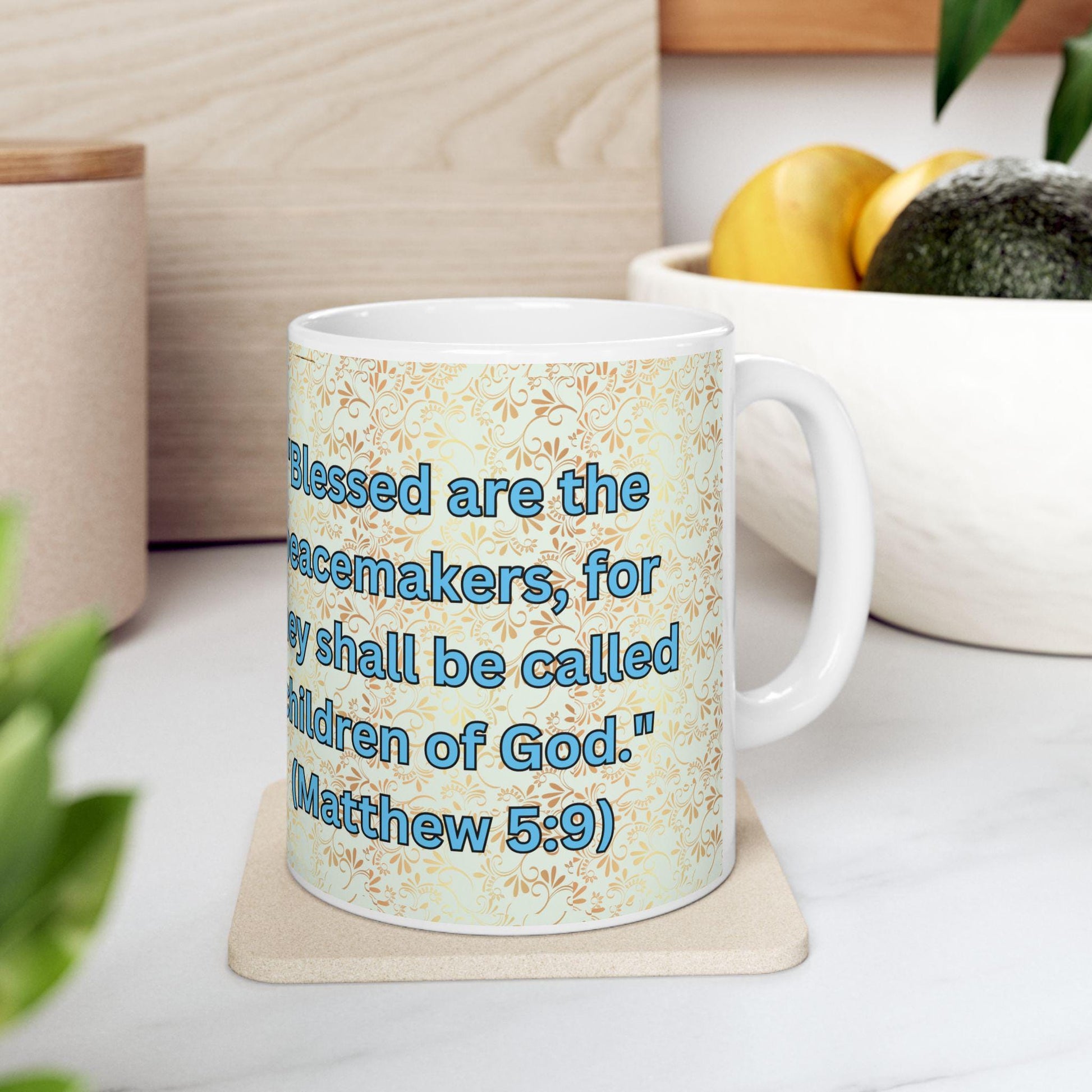 Blessed Are the Peacemakers ceramic mug featuring Matthew 5:9 and a serene dove design. Durable, microwave- and dishwasher-safe, perfect for coffee, tea, or as a meaningful gift for faith-filled moments