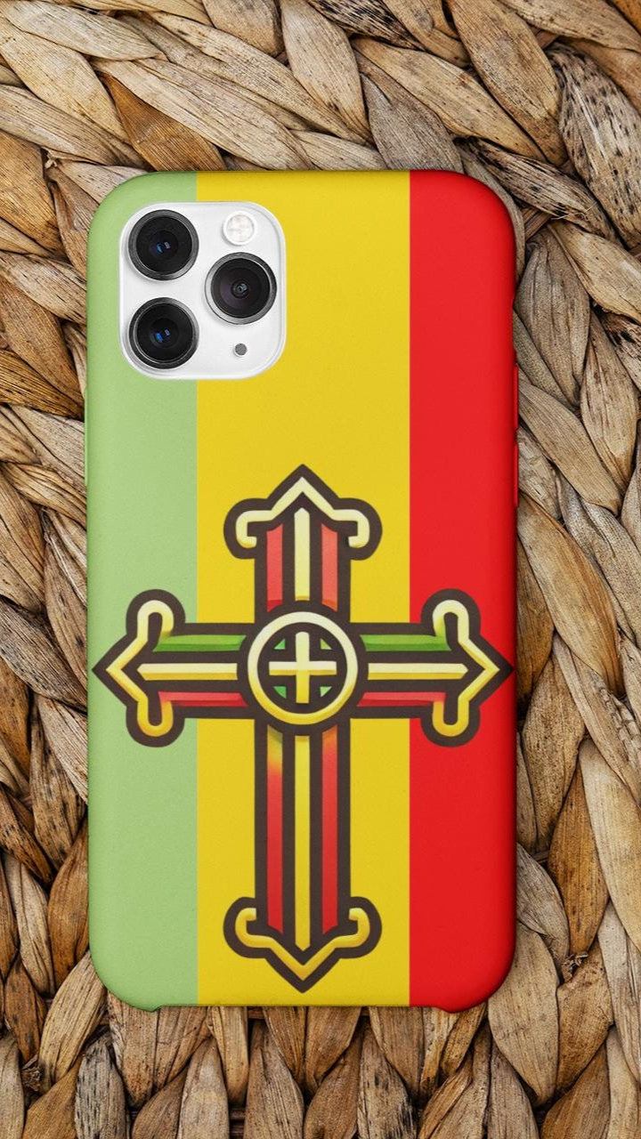 Show your Ethiopian Orthodox faith with this Tewahedo Cross Phone Case! Featuring a Ge’ez Orthodox design, it’s durable, lightweight & wireless charging compatible. A perfect Christian gift for iPhone & Samsung. Order now and carry your faith daily!